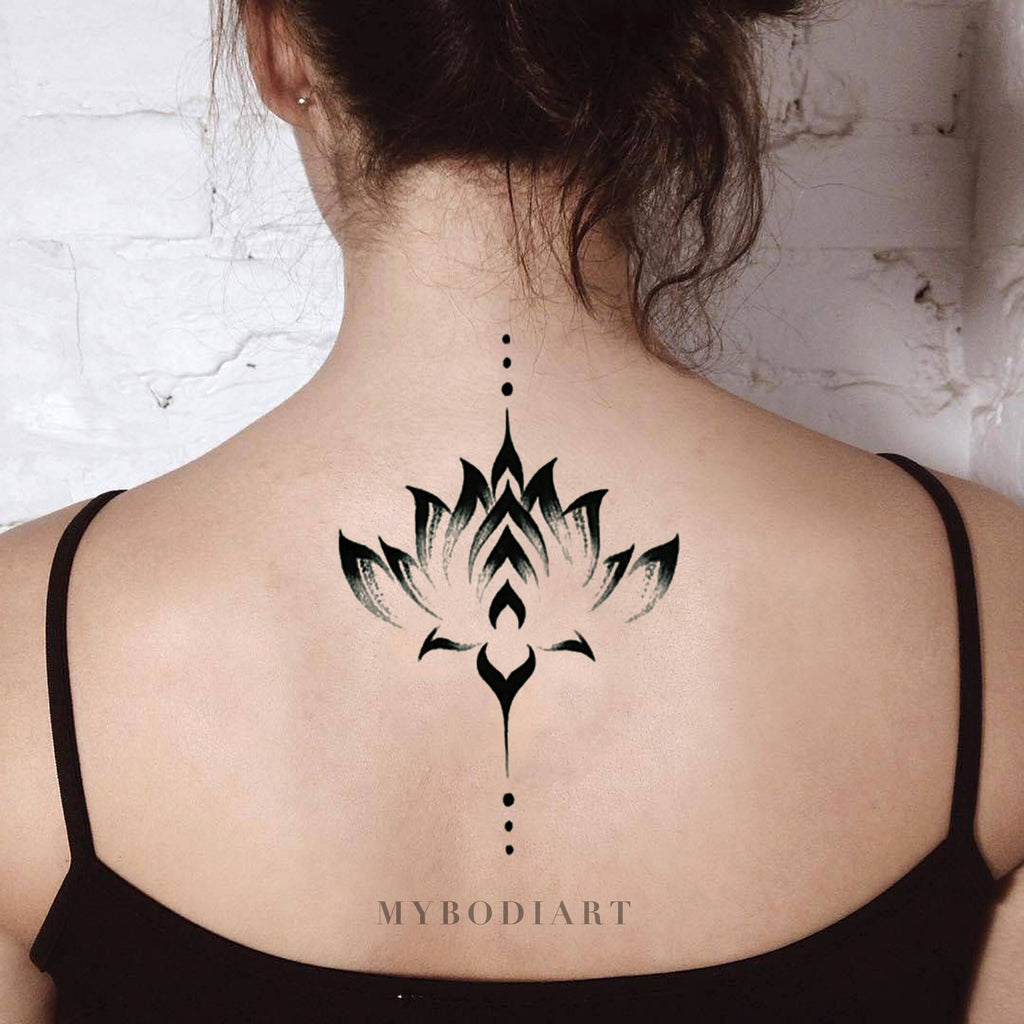 Lotus geometric linework down spine . . . . . . #lotus #backtattoo  #geo#photooftheday #tattoomodel #tattoos #tattooartist #Tattooart… |  Instagram