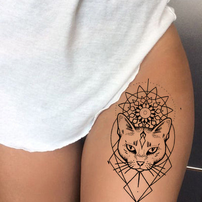 Watercolor cat tattoo pattern on thigh